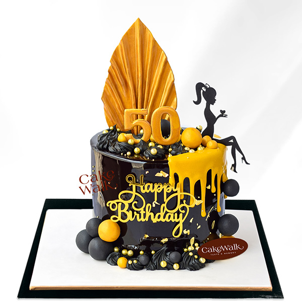 Adorable Black and Yellow Drip Cake